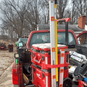 Milwaukee packout level and conduit bending holder